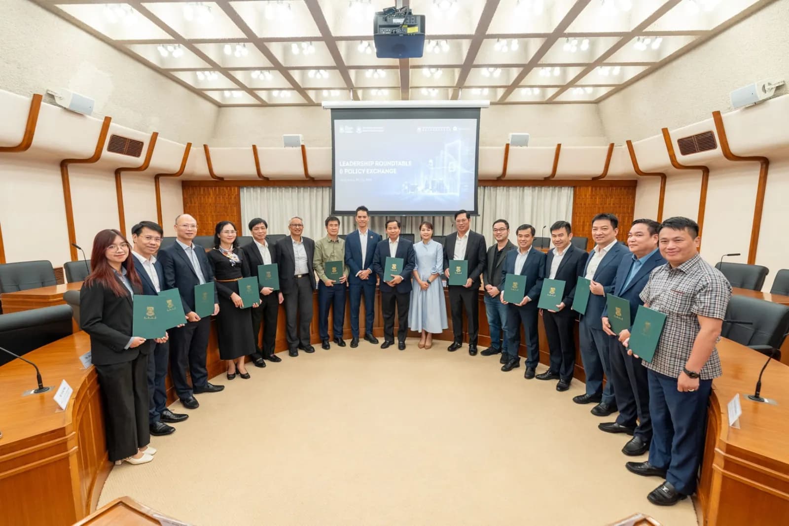 The Vietnam National Assembly Office delegation and HKU faculty in the council chamber after the policy exchange session