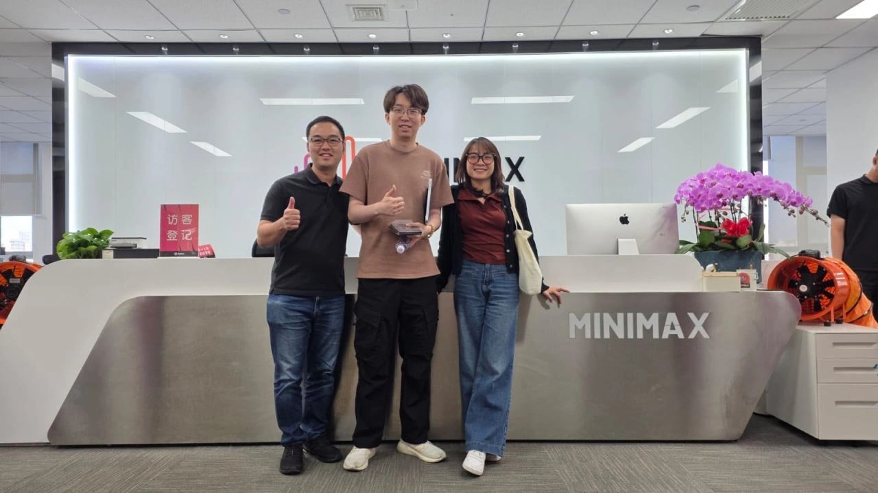 GenAI Fund team at the MiniMax reception desk in Shanghai