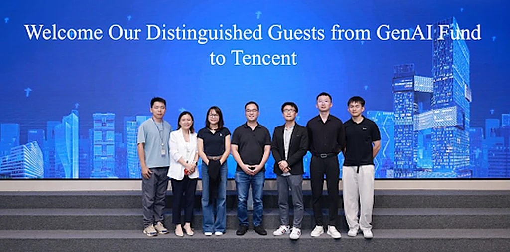 GenAI Fund delegation on stage under a Tencent welcome screen